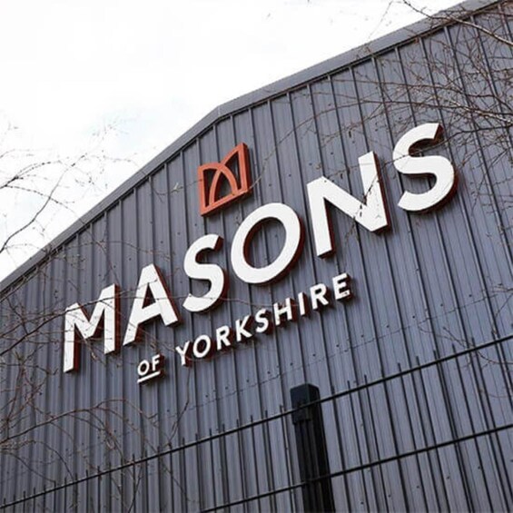 A building with the sign 'Masons of Yorkshire' on its facade. 4