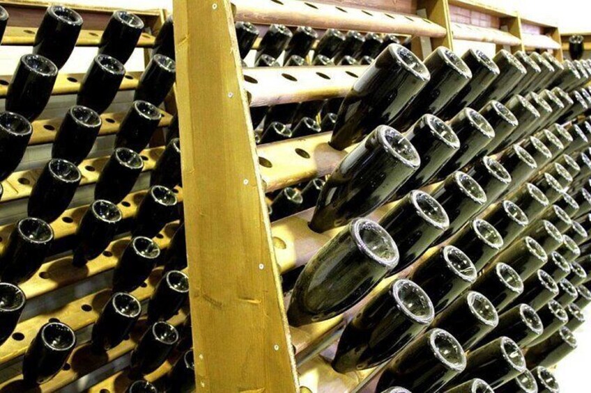 A rack of wine bottles. 3
