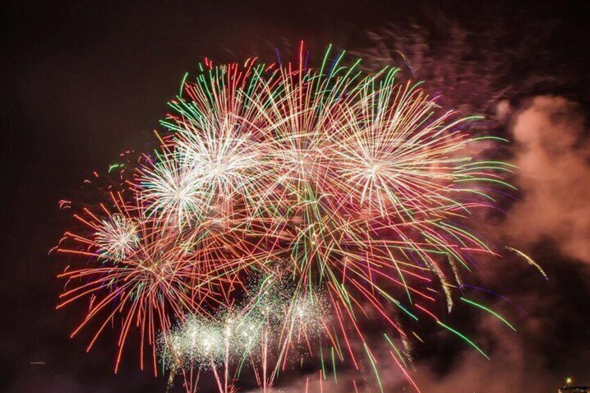 A night sky with fireworks. 1