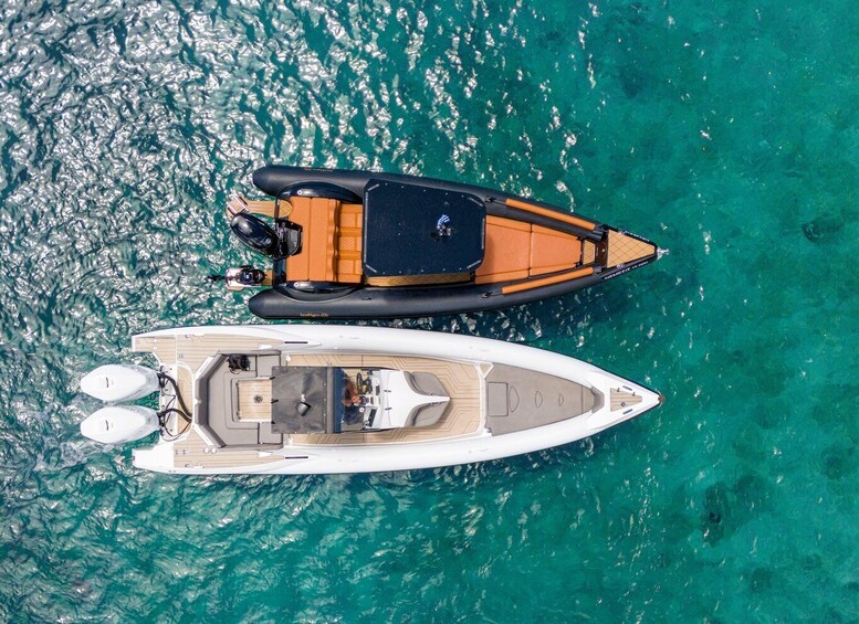 Two boats on turquoise water. 4