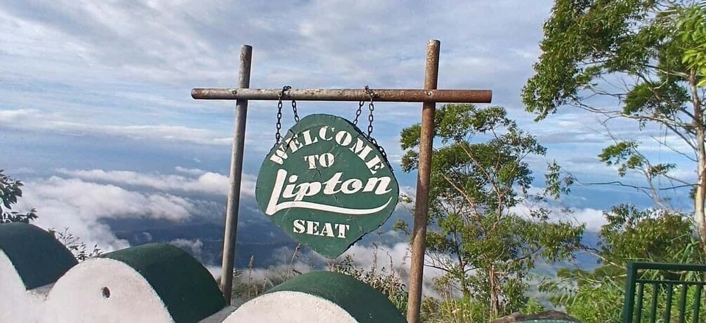 A sign that reads 'Welcome to Lipton Seat' against a backdrop of clouds and greenery. 3