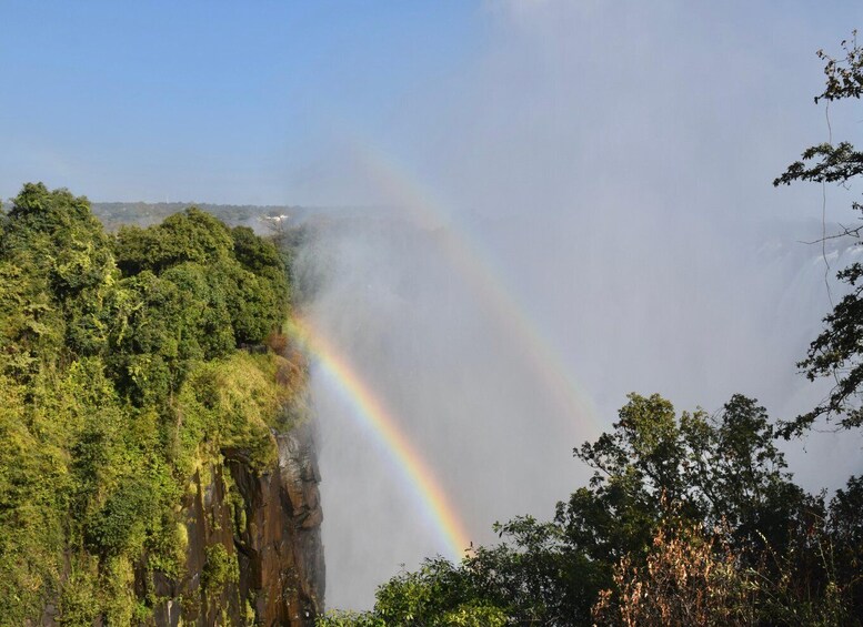 A waterfall with a rainbow. 2