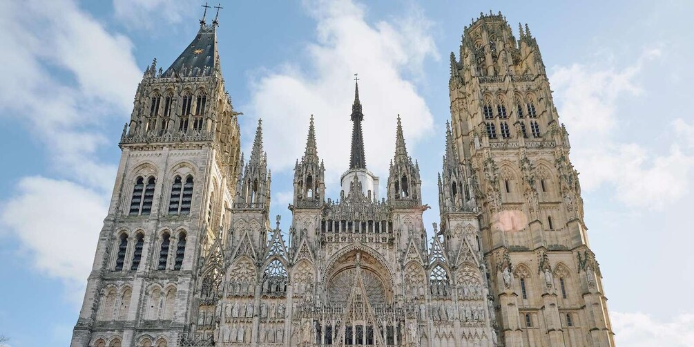 A Gothic cathedral with intricate spires and detailed stonework. 5