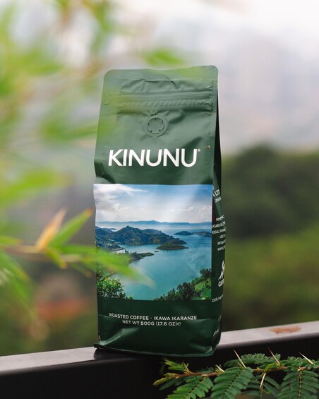 A bag of Kinunu roasted coffee with a scenic landscape of mountains and water. 2