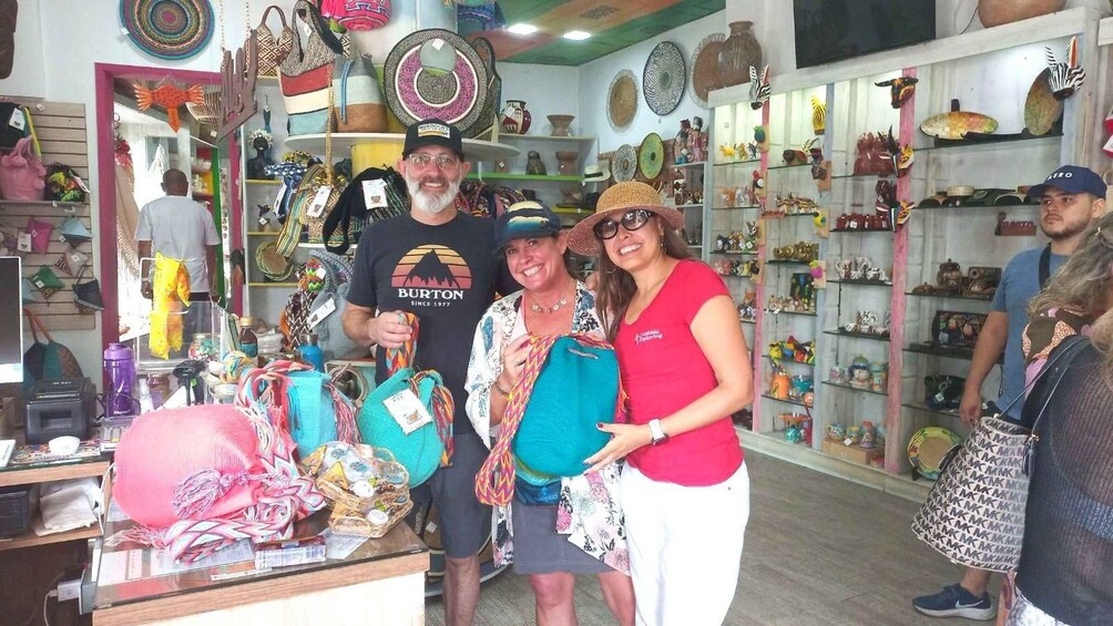 A store with various bags and accessories on display. 3