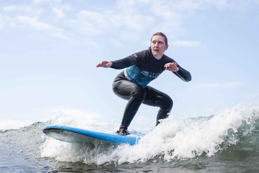 A person surfing on a wave. 3