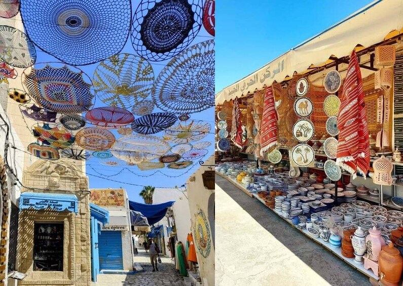 A narrow street with patterned umbrellas and a market stall selling pottery. 1