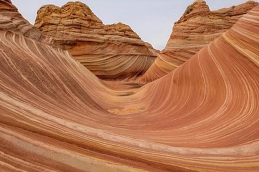 A canyon with layered rock formations. 1