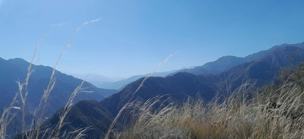 A mountainous landscape with clear skies. 5
