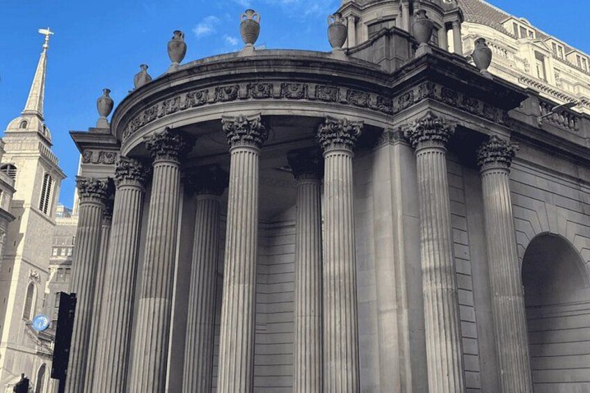 A classical building with tall columns and ornate details. 2