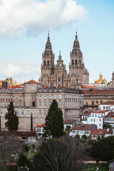 A historic cathedral with two prominent towers and a golden dome. 5