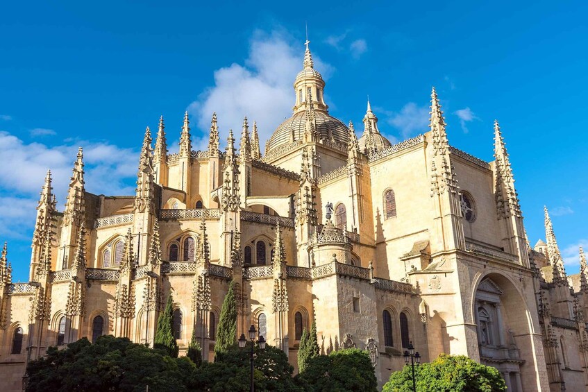 A large, ornate cathedral with multiple spires and intricate architectural details. 3