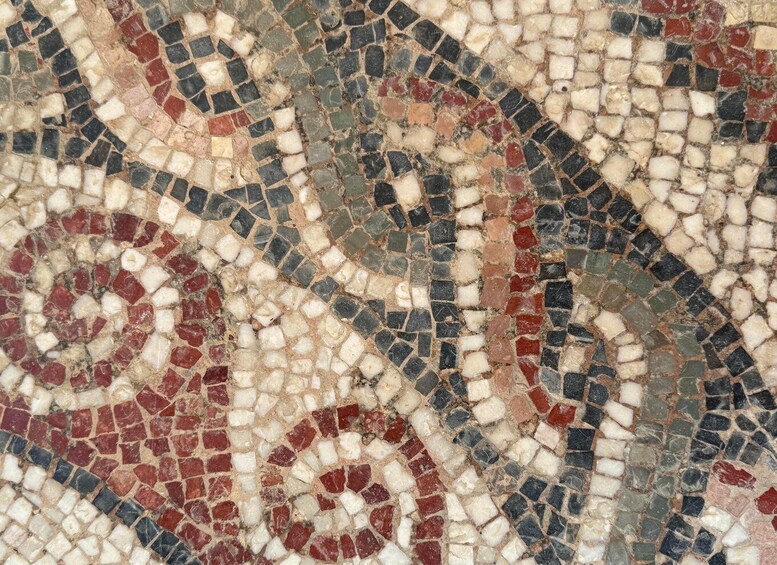 A mosaic with a spiral pattern. 5
