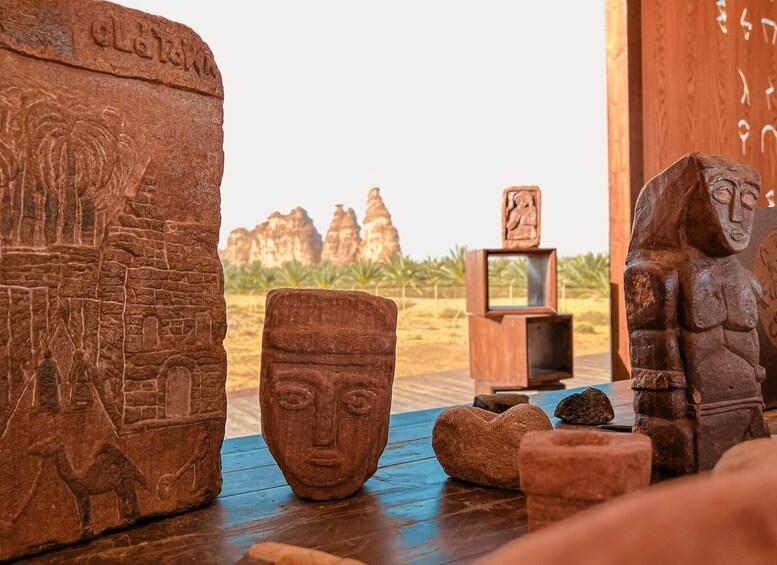 Ancient stone carvings, a wooden sculpture, and a desert landscape with rock formations. 3