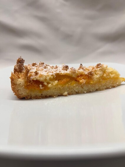 A slice of cake on a white plate. 5
