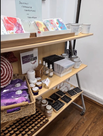 A display of various products including chocolate confections, lavender products, and decorative items. 2