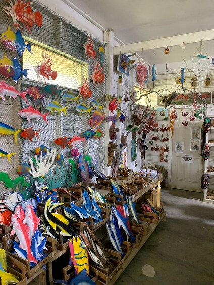 A store with various colorful fish and sea creature decorations. 5
