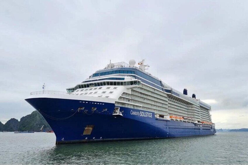 A large cruise ship named Celebrity SOLTICE sailing on calm waters. 1