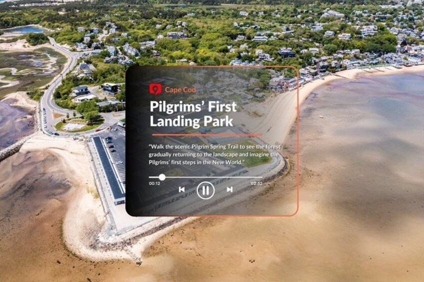 An aerial view of Cape Cod's Pilgrims' First Landing Park with a sandy beach and a road leading to the park. 3