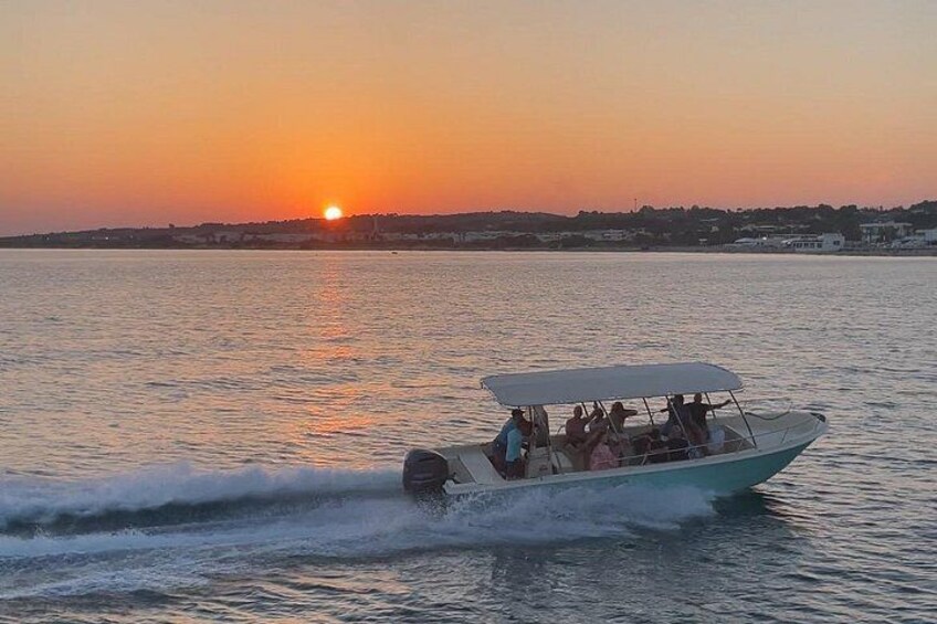 Boat excursion at sunset 1