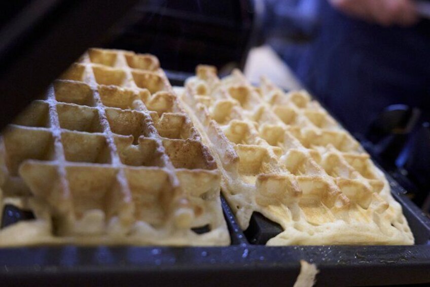A waffle iron with waffles. 2