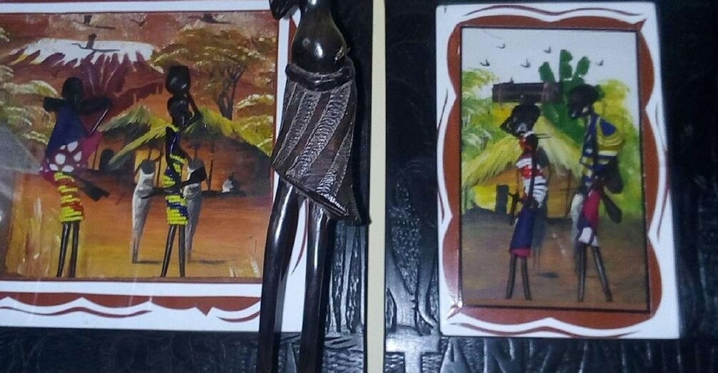 Two paintings with figures in traditional attire, one with a backdrop of trees and the other with a house. 2