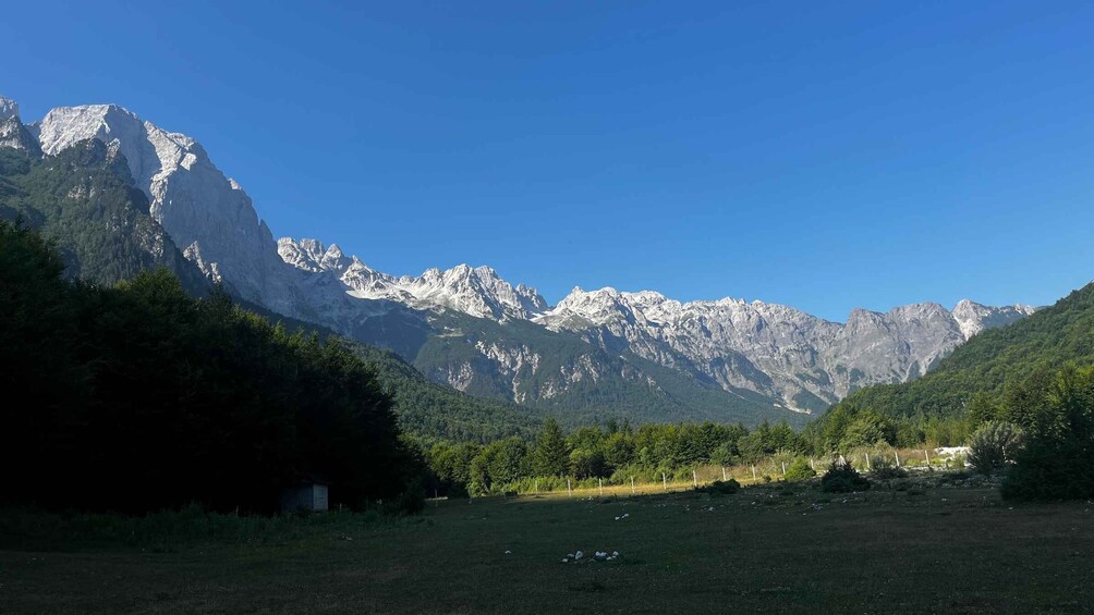A mountainous landscape with a clear sky. 2