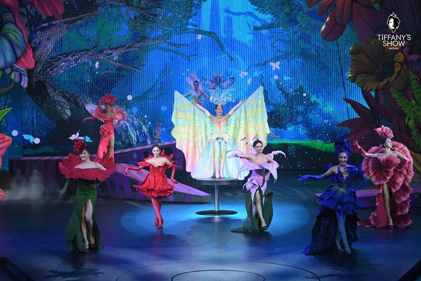 A stage performance with dancers in elaborate costumes. 4