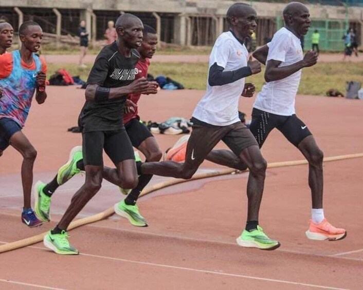 Athletes running on a track. 5