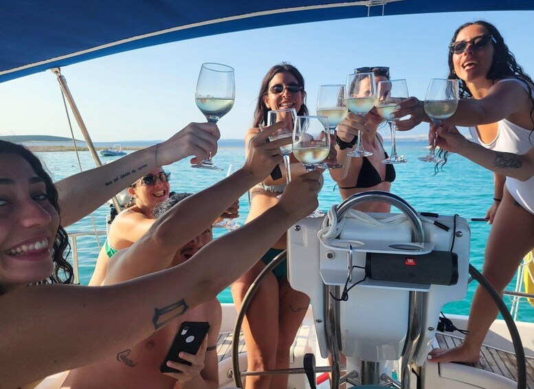 A group of people on a boat, toasting with wine glasses. 5
