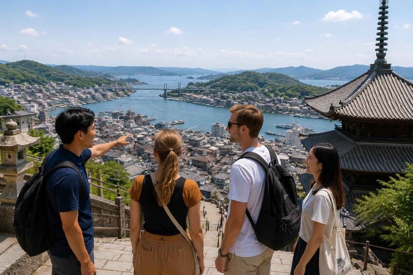 A group of people on a hill overlooking a coastal city with a bridge, traditional architecture, and a temple. 1