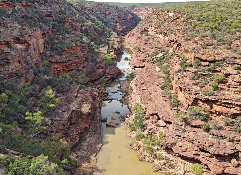 A canyon with a river running through it. 3