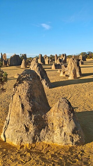 A desert landscape with numerous rock formations. 4