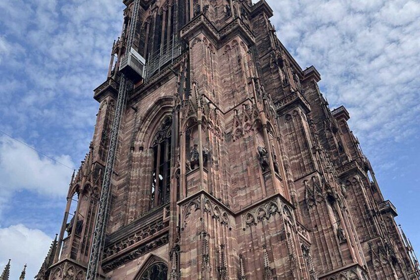 A large, historic cathedral with intricate stonework and a tall spire. 3