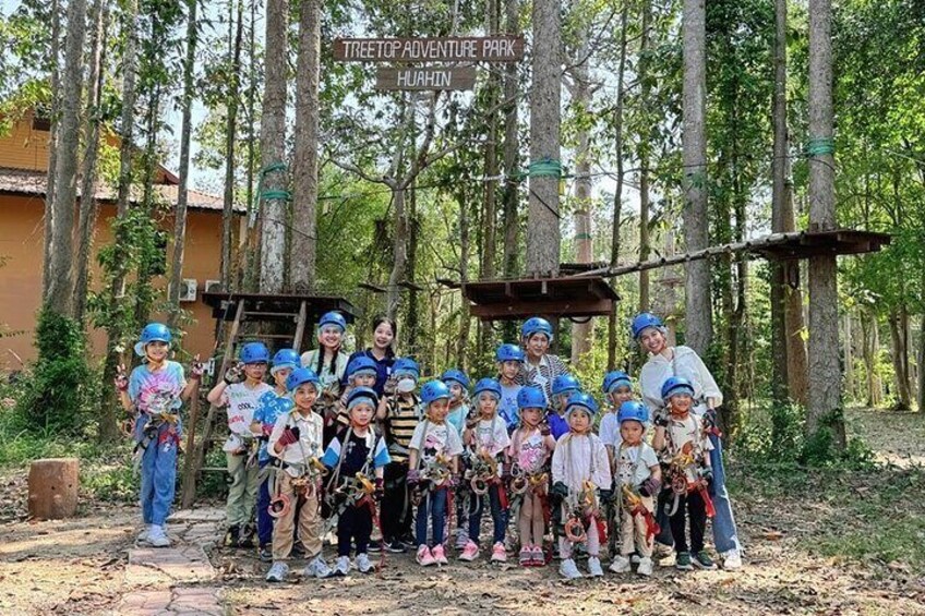 A group of children with helmets at Treetop Adventure Park in Huahin. 2