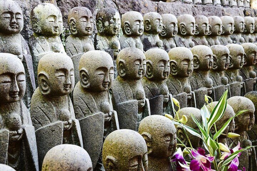 See the countless small statues, each holding a silent prayer 4