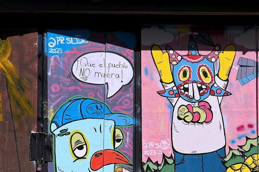 Two cartoon characters with speech bubbles on a wall. 2