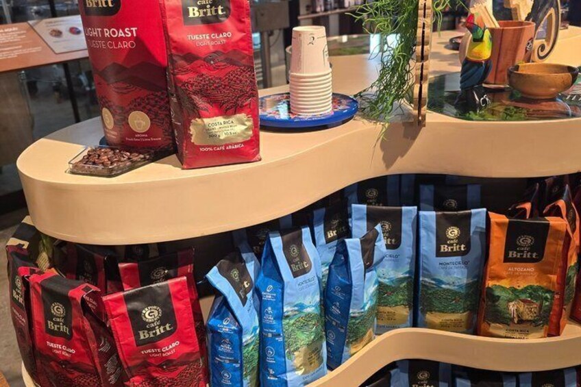 A display of coffee bags and a coffee machine. 2