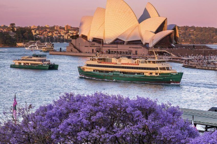 The Sydney Opera House with boats on Sydney Harbour. 3