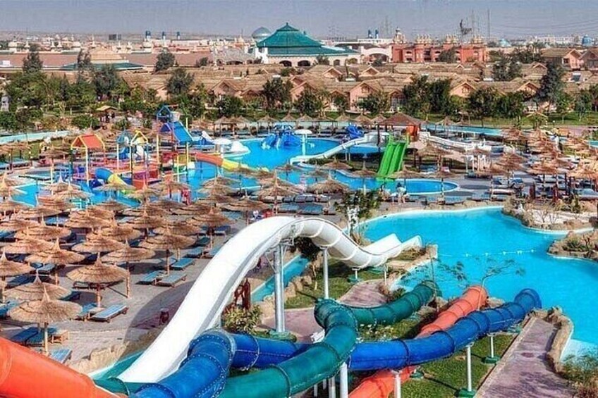 A water park with multiple slides and pools. 5