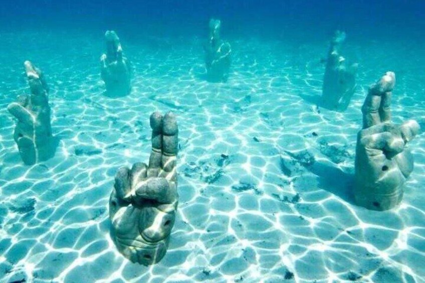 Isla Mujeres on luxury catamaran with snorkel, open bar and lunch 4