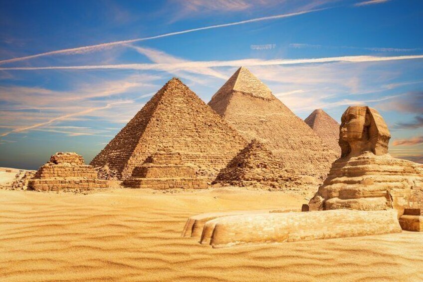 The Great Pyramids of Giza, the Sphinx, and a desert landscape. 1