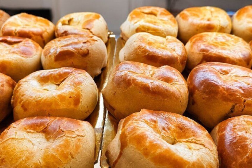 A tray of freshly baked rolls. 5