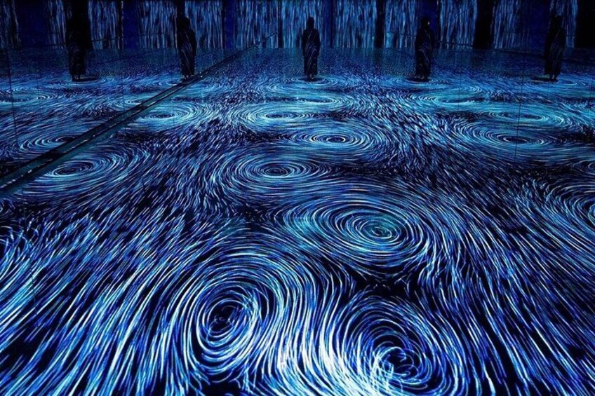 A floor with swirling patterns and a reflective surface. 2