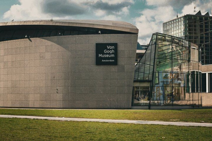 The Van Gogh Museum in Amsterdam with a modern glass structure. 5