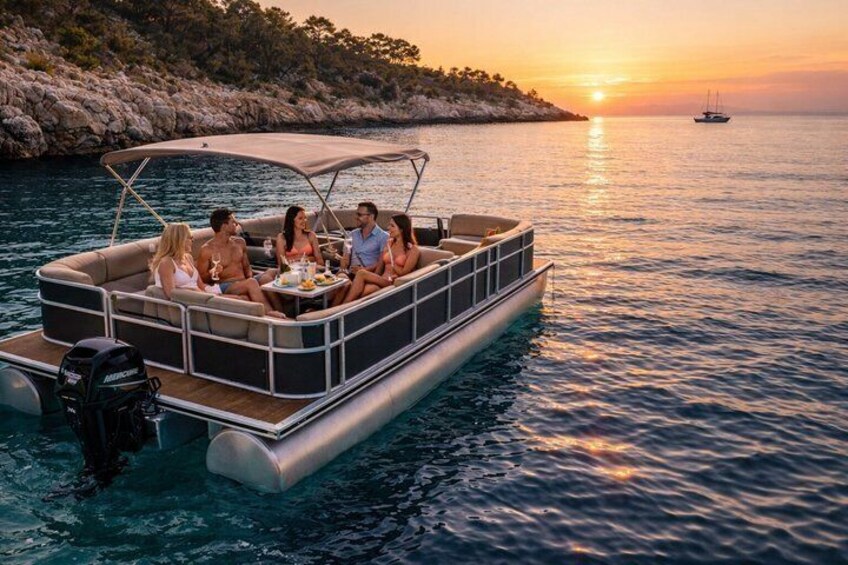 A pontoon boat with people on board, a sunset, and calm water. 1