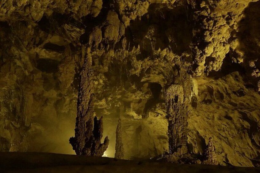 A cave with stalactites and stalagmites. 4