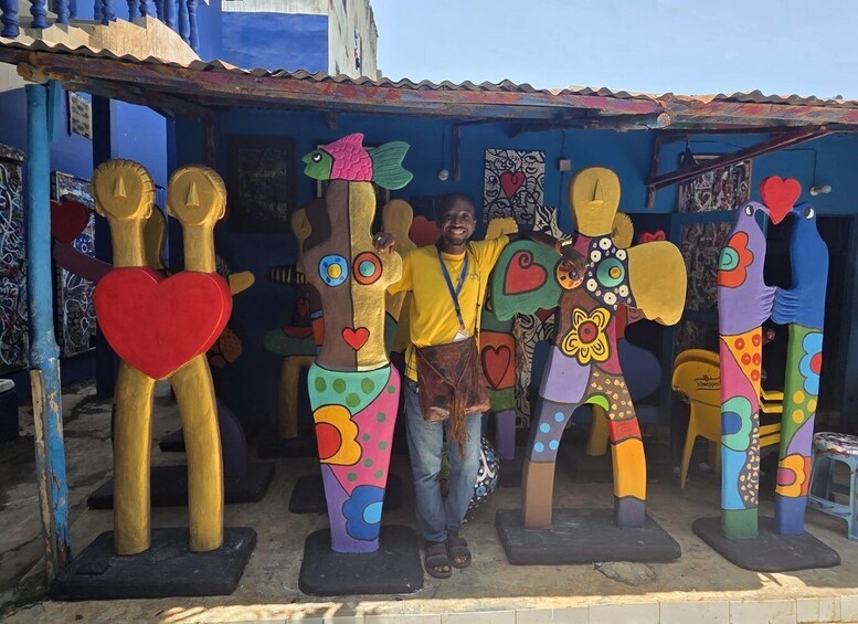 Colorful sculptures of human figures with hearts and abstract patterns. 5