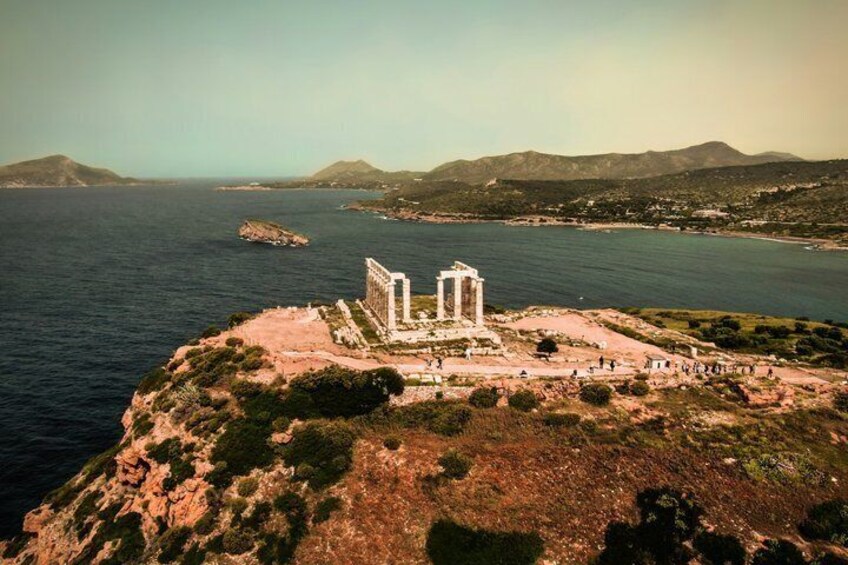 A coastal archaeological site with ruins and a clear view of the sea. 2