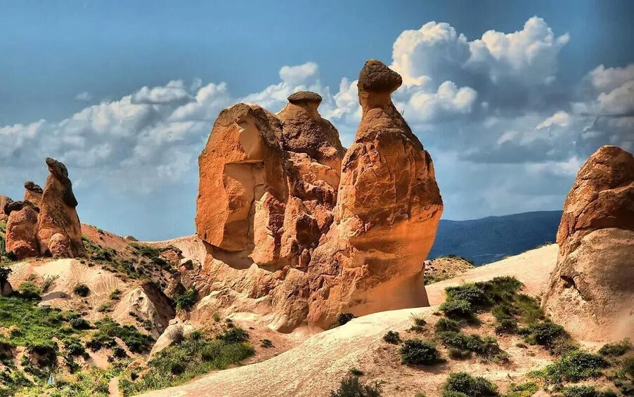 A desert landscape with prominent rock formations. 4
